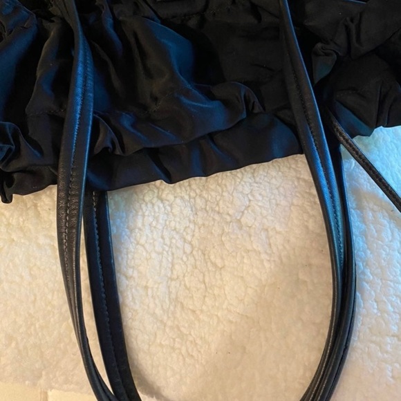Authentic black Prada bag with draw string. One draw string came off. Clean - Picture 6 of 13